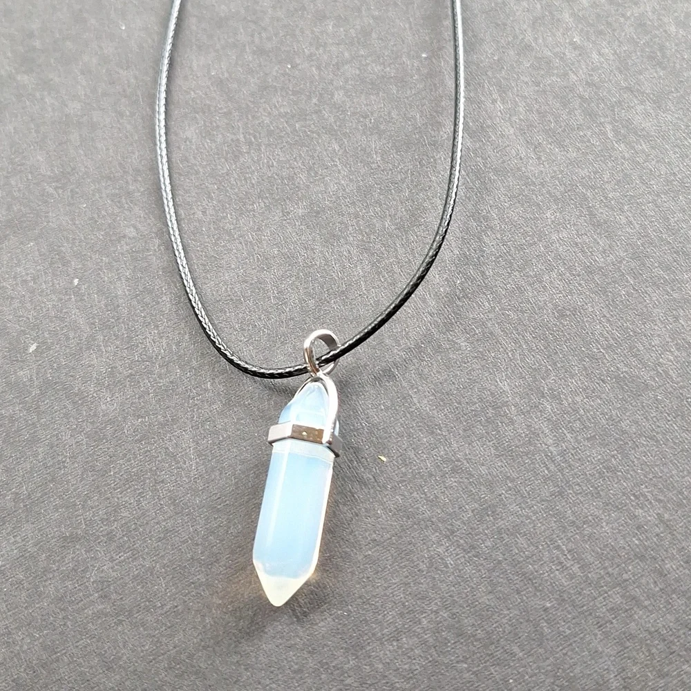 Clear crystal point pendant necklace on 16-inch faux leather chain